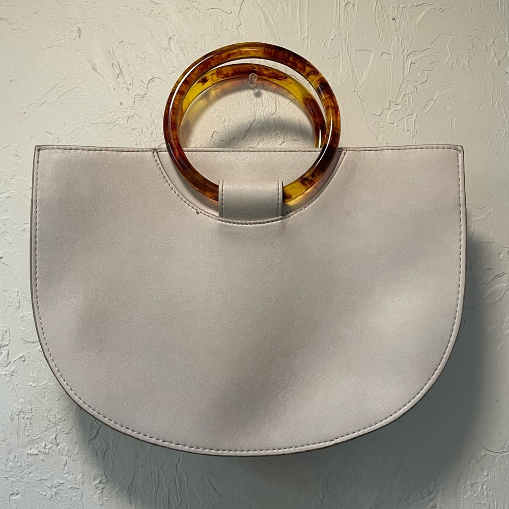 Half moon clutch